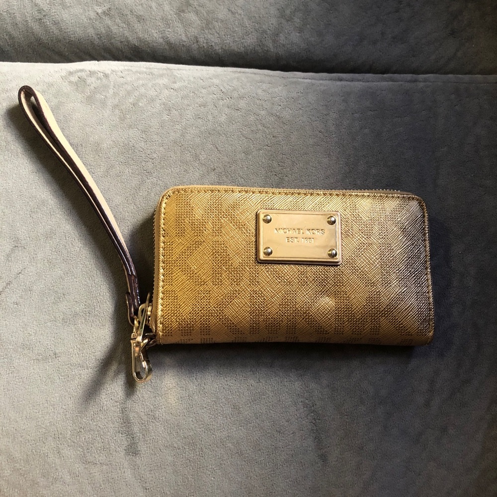 authentic Michael Kors gold wristlet wallet